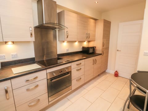 Fridge, electric kettle, toaster, cookware/dishes/utensils