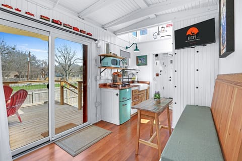 Enjoy the view through the large glass doors from the bench