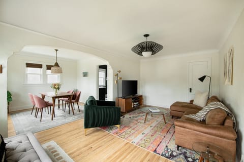 Front living room. Roomy couch, fast wifi, comfy chair and plenty of room to relax for everyone.