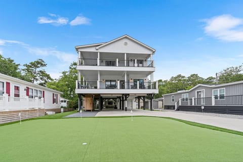 Spacious backyard with covered patios for relaxing and entertaining