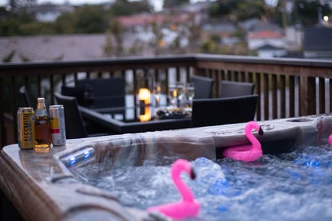 Soothe your senses in our luxurious hot tub. The ultimate relaxation awaits in the bubbling waters.