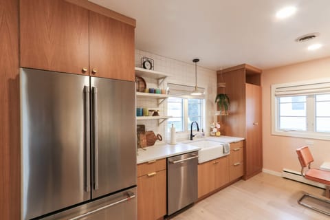 Stainless Steel Cafe Appliances with ample counter space and cabinets