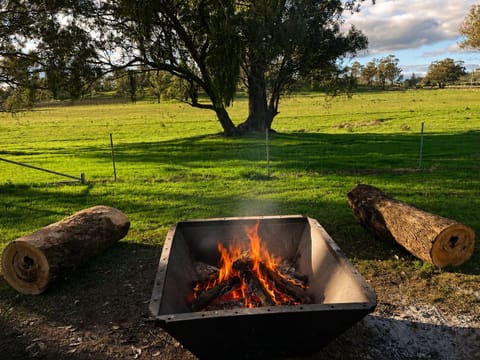 The outdoor fire pit is perfect for enjoying the cooler winter months.