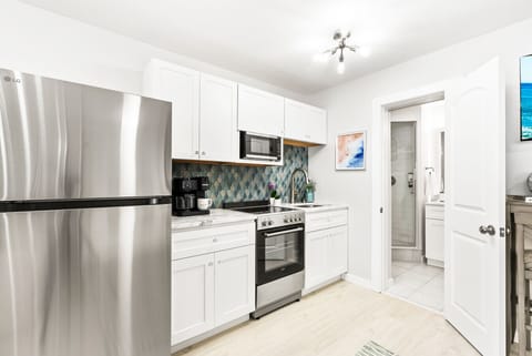 Dishware, silverware, and cookware all provided