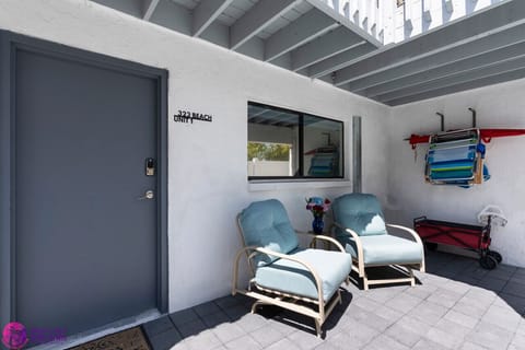 Entrance, via private patio, outdoor furniture, and beach load-out
