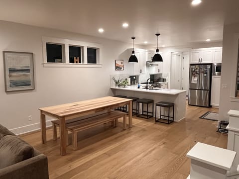 Huge game / dining table on the main floor; great for dining or game night!