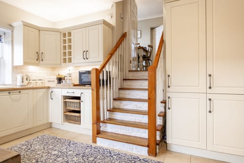 Lower ground floor: The cottage kitchen boasts plenty of storage