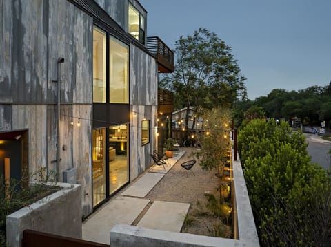 Stunning private courtyard with architectural lighting and a fountain