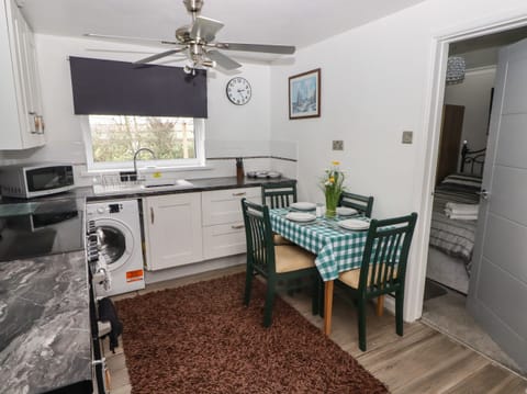 Fridge, electric kettle, toaster, cookware/dishes/utensils