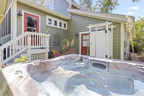 Peaceful backyard with hot tub and private shower
