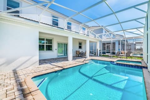 Spend the day at this screened-in swimming pool and whirlpool spa.