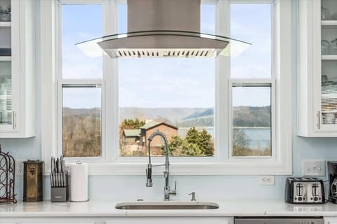 Cleaning up is a breeze with the spacious stainless sink and new dishwasher.