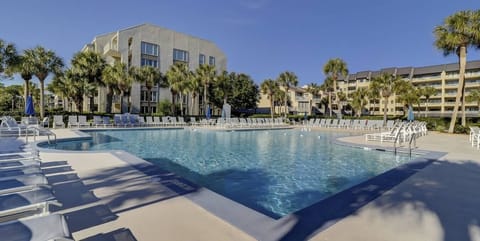Immerse yourself in oceanfront relaxation with family-friendly amenities, including a zero-entry heated pool, kiddie pool, and spa available YEAR-AROUND!