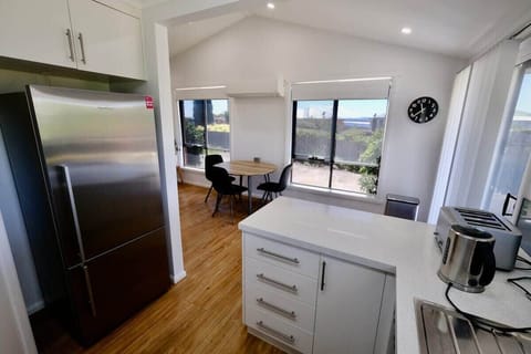 Enjoy the view of Pardoe Beach from kitchen and dining areas
