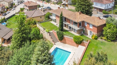 A spacious villa in Banyoles with a private pool, surrounded by lush greenery. The perfect retreat for relaxation and outdoor activities.