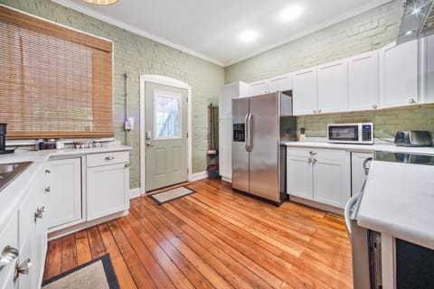 Kitchen: Explore the heart of the home in our well-equipped kitchen, designed for both functionality and style, making every meal a delightful experience.