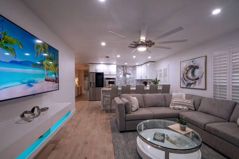 This open floor plan offers a seamless flow, fostering a sense of connectivity throughout the entire living area.