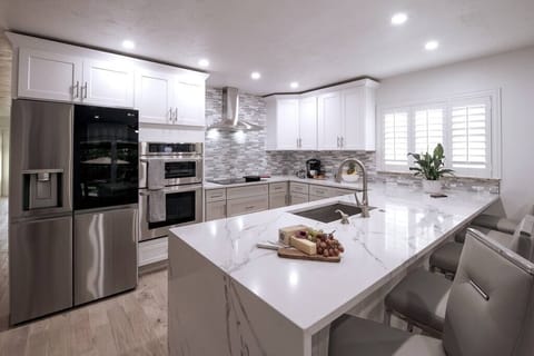 Sleek and modern kitchen with all new stainless appliances