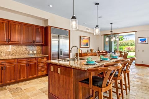 Open concept kitchen flows into the dining and living areas for easy entertaining.