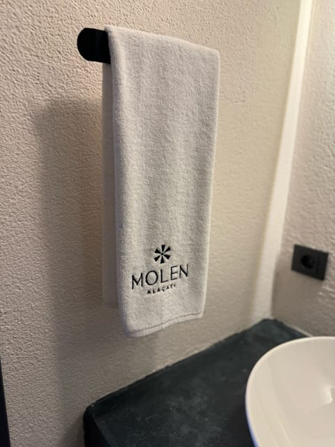 Hair dryer, slippers, towels, soap