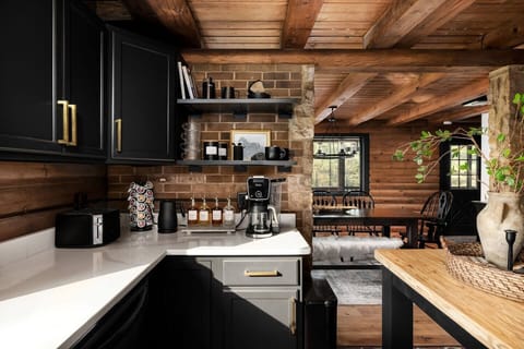 Fully stocked kitchen with a coffee and tea bar.