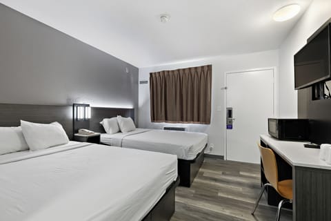 Blackout drapes, iron/ironing board, free WiFi, bed sheets