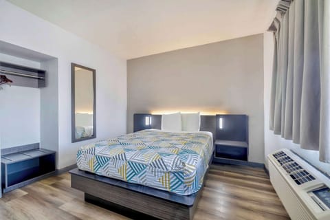 Desk, laptop workspace, free WiFi, bed sheets