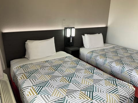 Blackout drapes, free WiFi, bed sheets