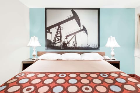 Desk, laptop workspace, blackout drapes, free cribs/infant beds