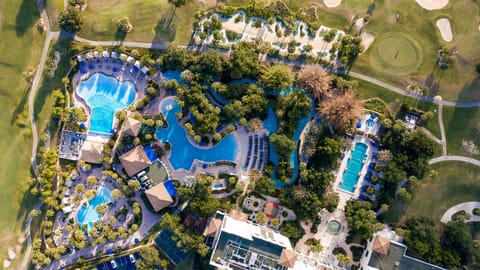 5 outdoor pools, open 8:00 AM to 10:00 PM, cabanas (surcharge)