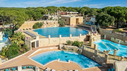 The aquatic area features no less than 9 pools to cater to every mood and preference, from adrenaline-filled water slides to peaceful sunbathing spots.
