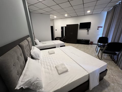 Standard Quadruple Room, Multiple Beds, Private Bathroom | Egyptian cotton sheets, premium bedding, memory foam beds