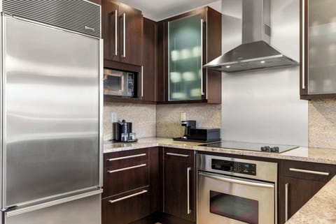 Full kitchen with stainless steel appliances