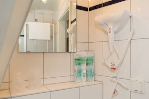 Hair dryer, towels, soap, shampoo