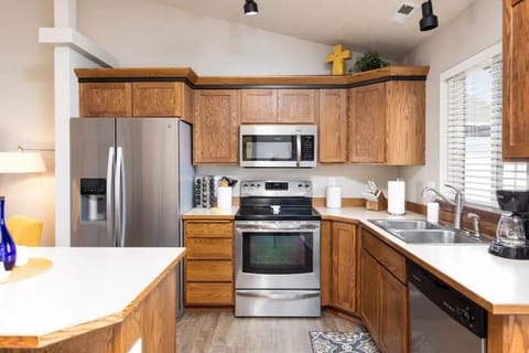 EVERYTHING you need is tucked away in this efficient kitchen!