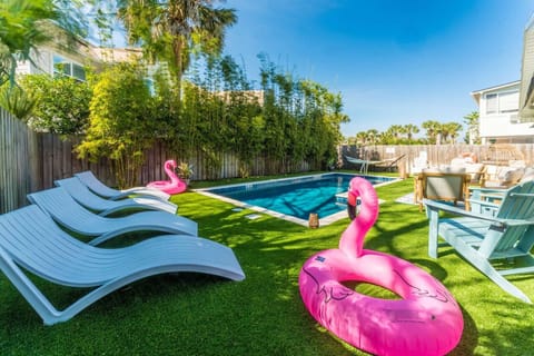 Heated saltwater pool with privacy bamboo fencing at Wine Down in Jacksonville Beach