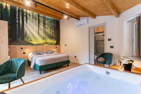 Exclusive Suite, Garden View | Frette Italian sheets, premium bedding, down comforters, minibar