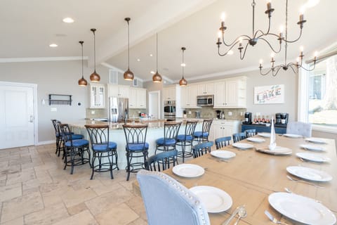 Large Kitchen that will seat 20 while overlooking the main lake.