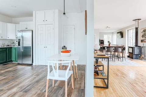 [Main Floor] From the entryway, do I go right to check out the dining space and deck or wait, what local goodies are waiting for me in that basket in the kitchen?