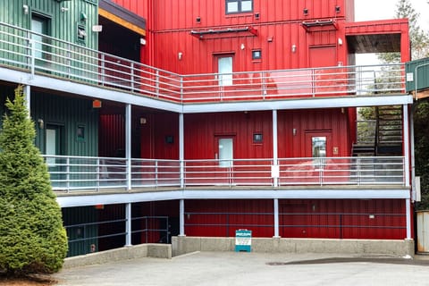 Exterior of the building; there is a ramp or flight of stairs for access to the 2nd floor