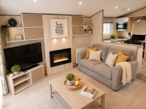 Luxury Mobile Home, 2 Bedrooms, Non Smoking | Living area | 50-inch Smart TV with digital channels, fireplace