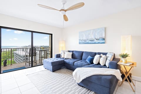 Unwind in a cozy living space that leads to outdoor balcony