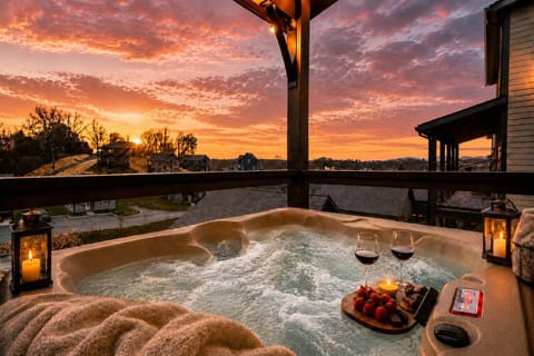 Relax in the hot tub and soak in the beautiful mountain view from the deck