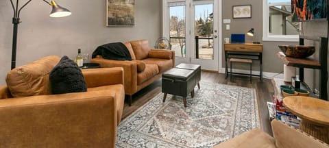 Cozy Living Area with 55" Smart TV | Vaulted Ceilings