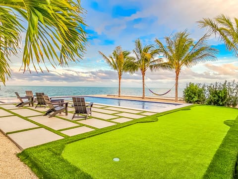 Ocean View by the pool with lounge chairs
