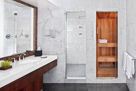 Combined shower/tub, deep soaking tub, designer toiletries, hair dryer