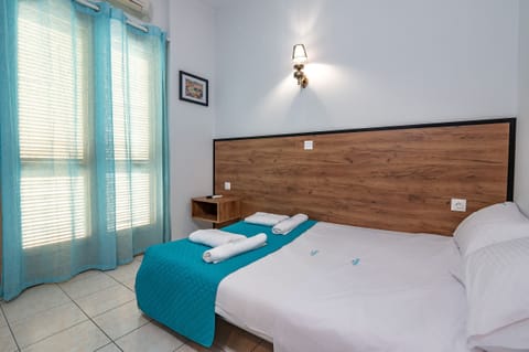 Classic Quadruple Room, Mountain View | In-room safe, soundproofing, free WiFi