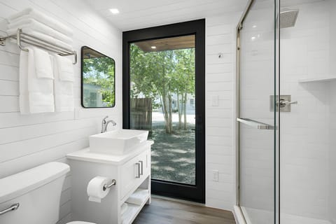 Shower, hair dryer, bathrobes, towels