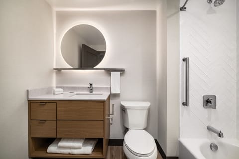 Combined shower/tub, hair dryer, towels, soap