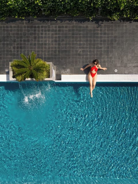 Seasonal outdoor pool, open 8:00 AM to 8:00 PM, sun loungers